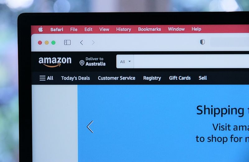 a laptop screen showing a part of Amazon website home page
