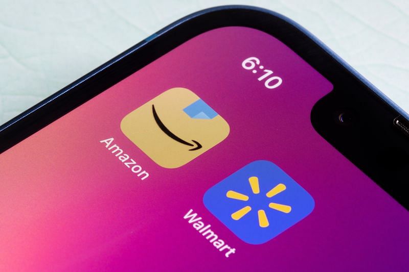 app logos of Amazon and Walmart displayed on a smartphone
