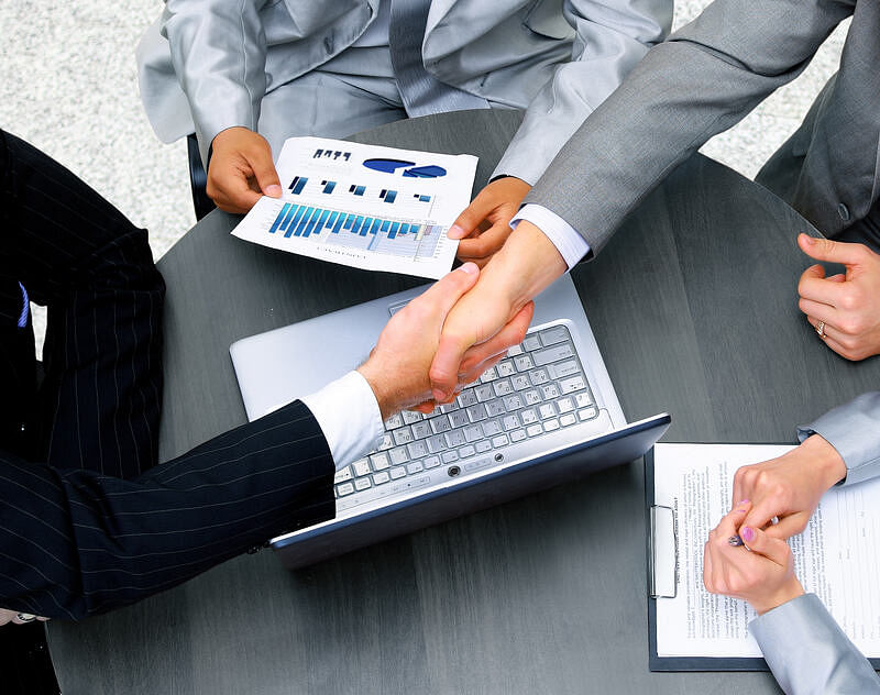 aerial view of business professionals doing a handshake