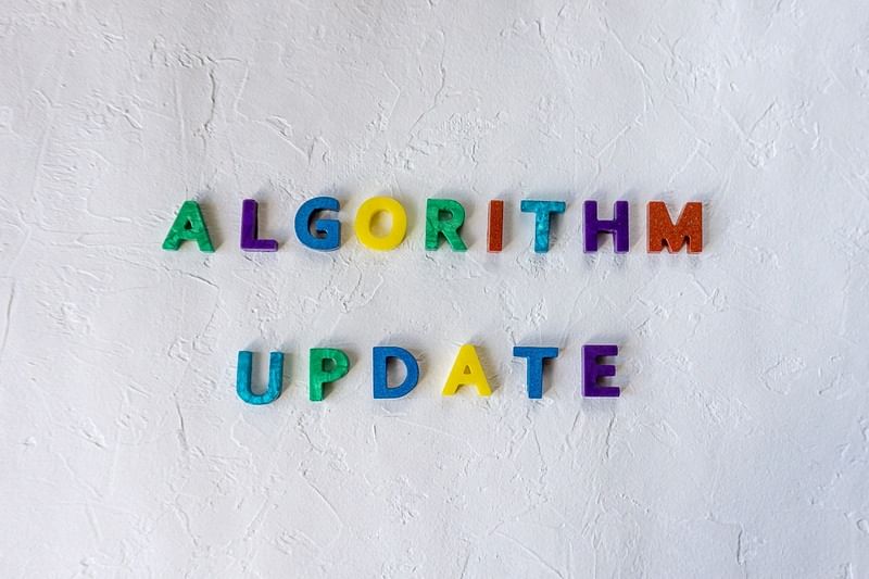 colourful letters spelling out algorithm update on white background
