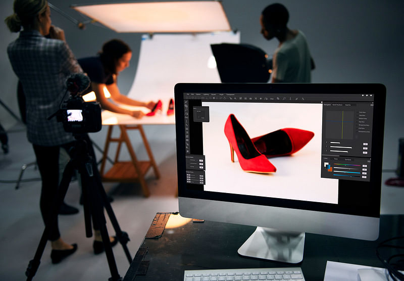 closeup of red heels product photo being edited in a software illustrating amazon image optimization